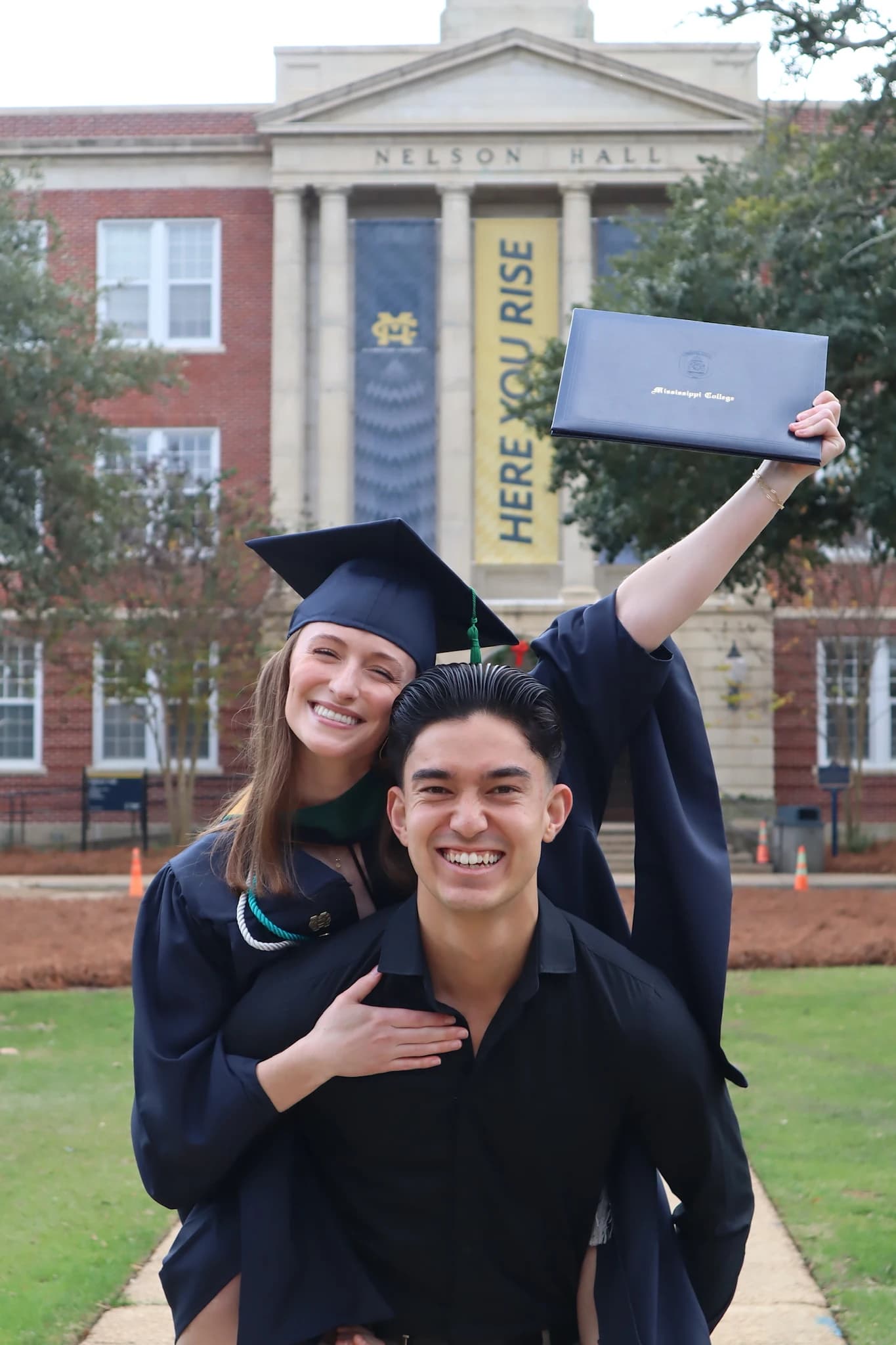 Corley and Oliver celebrating Corley’s graduation