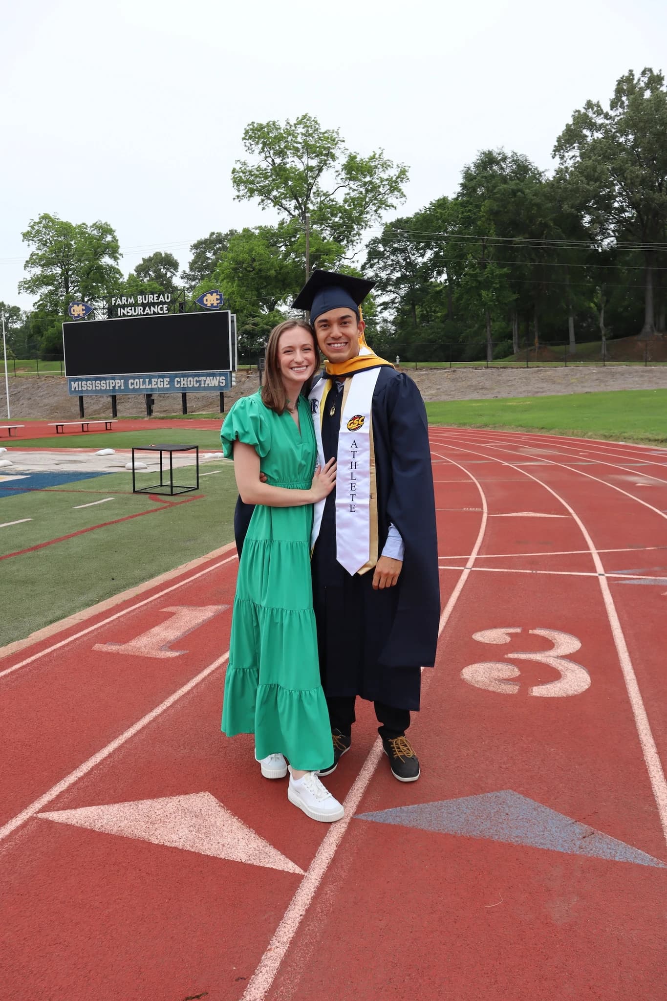 Corley and Oliver celebrating Oliver’s graduation
